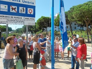 Izada de la bandera azul de El Portil.