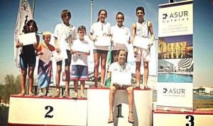 Los vencedores del Ibermán celebrado en la Punta del Moral.