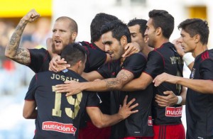 Los jugadores del Recre celebran uno de sus goles. / Foto: LFP.