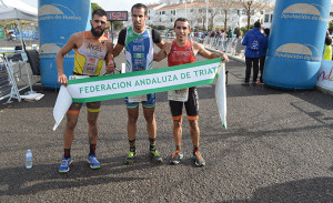 Podio masculino de la prueba celebrada en El Portil.