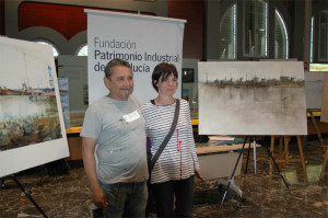 Los premiados junto a sus obras.