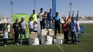 Uno de los podios en la XIV Carrera Popular Doñana Ecológica celebrada en Almonte.