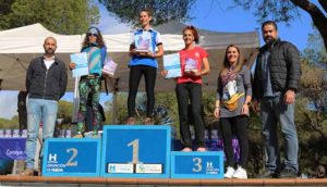 Las tres primeras clasificados en la prueba atlética en Cartaya.